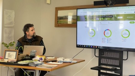 Tim Park showing BioBlitz stats and awarding spot prizes